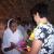 providing new clothes for poor widows and villagers.